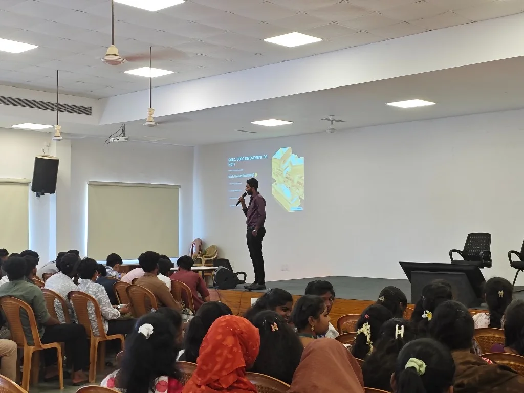 Live presentation explaining stock market basics and financial planning on screen.